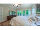 Spacious bedroom with balcony access, offering serene views and natural light at 729 Lorentello Cir, Hillsborough, NC 27278