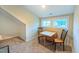 Cozy dining area with small table set in a naturally lit room at 729 Lorentello Cir, Hillsborough, NC 27278