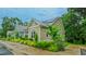 Well-maintained home with a metal roof, solar panels and a beautifully landscaped yard at 729 Lorentello Cir, Hillsborough, NC 27278
