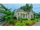 Charming craftsman home with manicured landscaping and inviting front porch featuring a painted blue door at 729 Lorentello Cir, Hillsborough, NC 27278