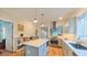 Bright and airy kitchen with stainless steel appliances and a center island at 729 Lorentello Cir, Hillsborough, NC 27278