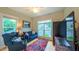 Relaxing living room with hardwood floors and natural light at 729 Lorentello Cir, Hillsborough, NC 27278