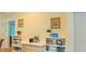 Charming display shelves showcase decor, books, and beverages, enhancing the living space at 729 Lorentello Cir, Hillsborough, NC 27278