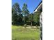 Spacious backyard with a stone patio and a dining set, perfect for outdoor enjoyment at 75 Mountainside Ln, Sanford, NC 27332