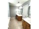 Bathroom featuring dual sink vanity and tile flooring at 75 Mountainside Ln, Sanford, NC 27332