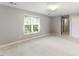 Large bedroom with big window and closet space at 75 Mountainside Ln, Sanford, NC 27332