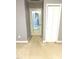 Bedroom featuring carpet, closet, and glass pane door at 75 Mountainside Ln, Sanford, NC 27332