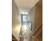 Foyer with pendant lighting, wall mirror, and hardwood floors at 75 Mountainside Ln, Sanford, NC 27332