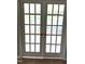 Pair of French doors leading to the sun room at 75 Mountainside Ln, Sanford, NC 27332