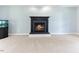 View of the fireplace in this living room with a built-in aquarium at 75 Mountainside Ln, Sanford, NC 27332