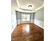 Living room showcasing hardwood floors, textured ceiling, and chair-rail molding at 75 Mountainside Ln, Sanford, NC 27332