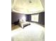 Spacious main bedroom with a large window and textured trey ceiling at 75 Mountainside Ln, Sanford, NC 27332