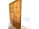 Pantry with wooden doors and dark colored hardware in kitchen at 75 Mountainside Ln, Sanford, NC 27332