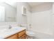 Clean bathroom featuring a vanity with wood cabinets and a shower-tub combination at 96 Landmark Dr, Angier, NC 27501