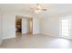 Bright living area showcasing tile floors and open access to the kitchen at 96 Landmark Dr, Angier, NC 27501