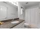 Cozy bathroom with granite countertop and shower/tub combination at 100 Culbreth Rd # C, Chapel Hill, NC 27516