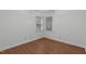 Bedroom with wood flooring and natural light at 100 Culbreth Rd # C, Chapel Hill, NC 27516