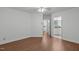 Bright bedroom featuring wood flooring and a view into the bathroom at 100 Culbreth Rd # C, Chapel Hill, NC 27516