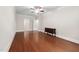 Spacious bedroom featuring hardwood floors, neutral walls, and classic trimwork at 10310 Sablewood Dr # 111, Raleigh, NC 27617