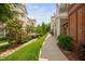 Landscaped walkway between townhomes showcasing the community's design and greenery at 10310 Sablewood Dr # 111, Raleigh, NC 27617