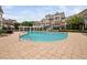 Resort-style community pool with ample seating and well-maintained landscaping at 10310 Sablewood Dr # 111, Raleigh, NC 27617