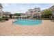 Resort-style community pool with ample seating and well-maintained landscaping at 10310 Sablewood Dr # 111, Raleigh, NC 27617