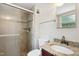 Neutral bathroom with tiled shower, granite countertop, and bright lighting at 104 Benedict Ln, Raleigh, NC 27614
