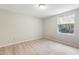 Bedroom with window, carpet, and light walls at 104 Benedict Ln, Raleigh, NC 27614