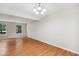Spacious living room featuring hardwood floors and ample natural light at 104 Benedict Ln, Raleigh, NC 27614