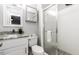 Clean and modern bathroom with a glass shower, white vanity, and neutral color scheme at 105 Litchfield Ct, Rocky Mount, NC 27803