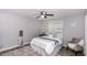 Cozy bedroom with a comfortable bed, neutral decor, and hardwood floors at 105 Litchfield Ct, Rocky Mount, NC 27803