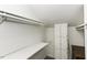 Bright walk-in closet with built-in shelves and ample storage space at 105 Litchfield Ct, Rocky Mount, NC 27803