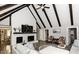 Spacious living room with vaulted ceilings, a brick fireplace, and hardwood floors at 105 Litchfield Ct, Rocky Mount, NC 27803