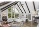 Bright living room with a large window, vaulted ceilings, and hardwood floors at 105 Litchfield Ct, Rocky Mount, NC 27803