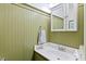 Charming bathroom with vintage-style mirror and soft-toned vanity, blending classic design with modern functionality at 107 Canyon Run, Cary, NC 27513