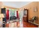 Inviting living room with hardwood floors, natural light, comfortable seating, and elegant decor at 107 Canyon Run, Cary, NC 27513