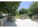 Inviting backyard deck and lush green space, perfect for outdoor entertaining and relaxation at 109 Perry Farms Dr, Apex, NC 27502