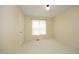 Bedroom with neutral walls, carpet, window, and white door at 109 Perry Farms Dr, Apex, NC 27502
