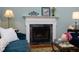 Elegant fireplace with marble surround and decorative mantle at 109 Perry Farms Dr, Apex, NC 27502