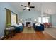 Bright living room with vaulted ceilings, fireplace, and stylish furnishings at 109 Perry Farms Dr, Apex, NC 27502