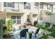 Backyard patio featuring a comfortable seating area with an outdoor rug, creating a cozy and inviting space at 11217 Maplecroft Ct, Raleigh, NC 27617