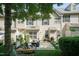 Charming backyard patio with outdoor seating, perfect for entertaining or relaxing in the shade at 11217 Maplecroft Ct, Raleigh, NC 27617