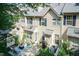 Aerial view of a cozy backyard patio with a dining area, perfect for outdoor entertaining and relaxation at 11217 Maplecroft Ct, Raleigh, NC 27617