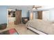 Spacious bedroom featuring a custom closet with sliding barn doors and decor at 11217 Maplecroft Ct, Raleigh, NC 27617