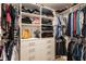Walk-in closet features custom shelving for optimal storage and organization at 11217 Maplecroft Ct, Raleigh, NC 27617