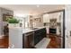 Modern kitchen with stainless steel appliances, quartz countertops, and ample storage space at 11217 Maplecroft Ct, Raleigh, NC 27617