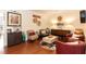 Cozy living room showcasing hardwood floors, comfortable seating, and decorative accents at 11217 Maplecroft Ct, Raleigh, NC 27617