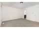Large bedroom featuring neutral carpet and an ensuite bathroom at 1209 Waterford Green Dr, Apex, NC 27502