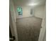 Bright bedroom featuring neutral carpet, two windows, and white trim at 1209 Waterford Green Dr, Apex, NC 27502
