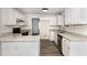 Open kitchen with granite countertops, stainless steel appliances, and neutral tones at 1209 Waterford Green Dr, Apex, NC 27502